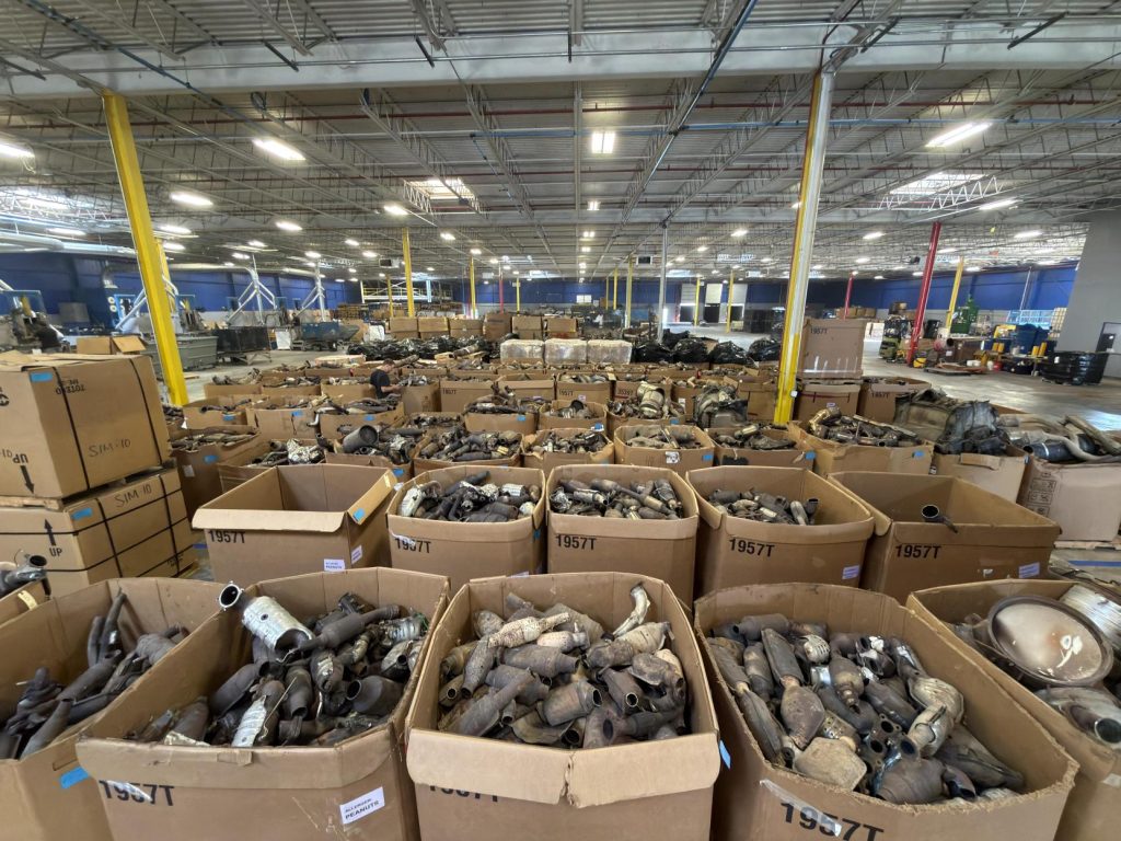 Warehouse filled with gaylord boxes of catalytic converters